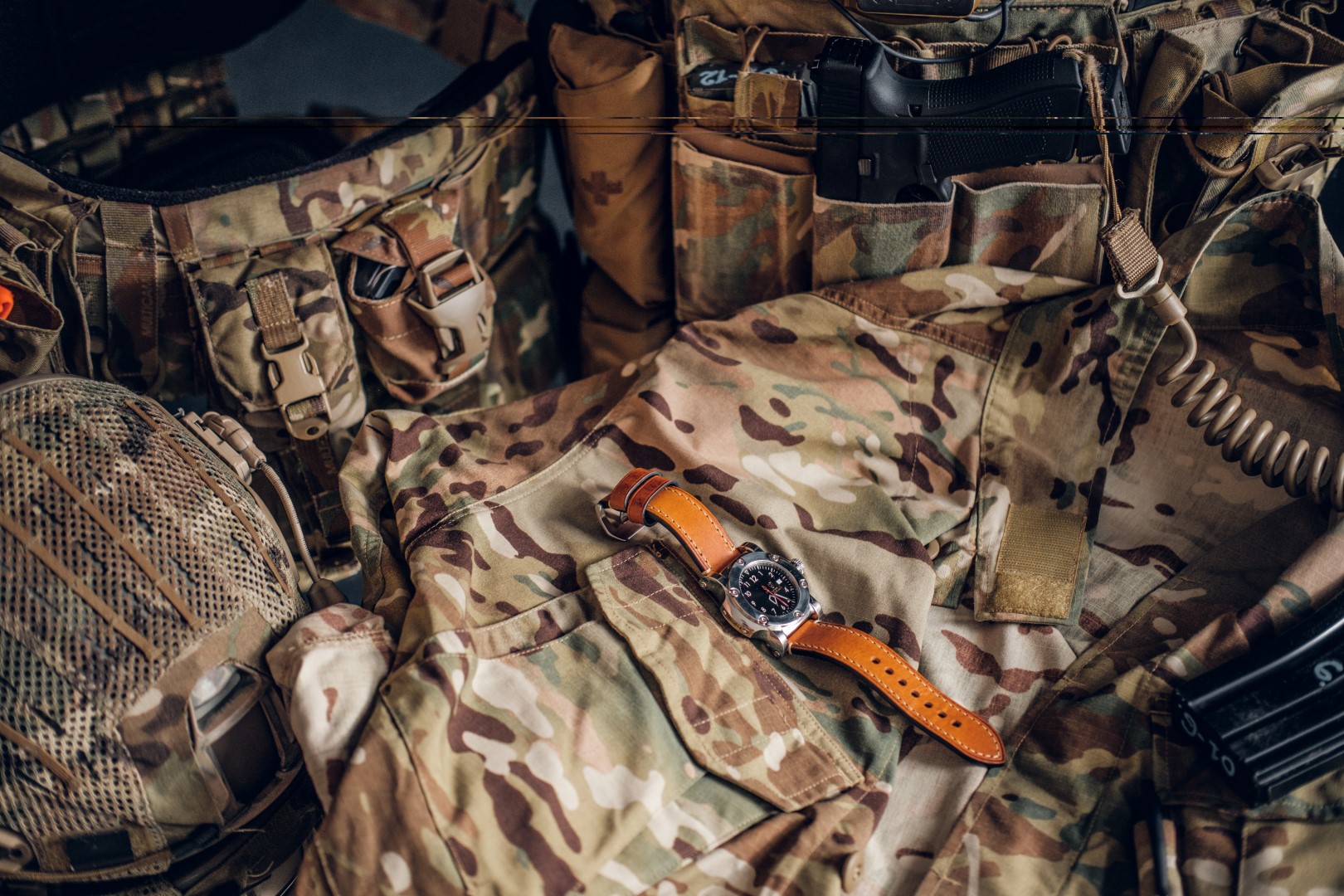 still-life-with-nice-watch-military-uniform-with-typical-camo-pattern